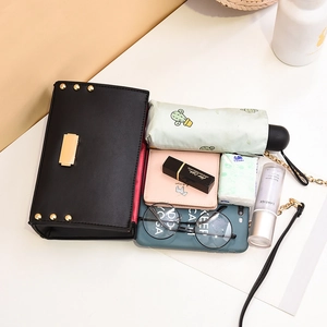 Black PU leather crossbody bag with gold studs and large capacity for daily items