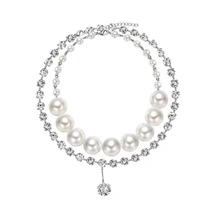 Elegant double-layer necklace featuring gradient pearls and a sparkling zircon pendant