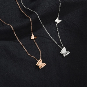 Minimalist double layer butterfly necklace in rose gold and silver with matte finish