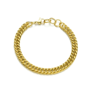Close-up of golden double-woven cuban chain bracelet with lobster clasp detail