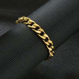 Unisex gold Cuban curb link bracelet in hip hop style made of polished stainless steel