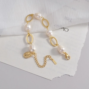 Double-layered gold stainless steel bracelet with pearls and Virgin Mary relief coin charm