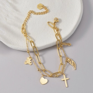 Double-layer stainless steel heart and bear charm bracelet with gold finish for women