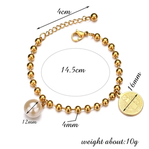 Bracciale a sfere dorate con medaglia San Benedetto, perla 12mm e catena di estensione