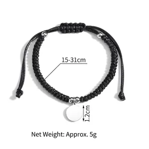 Bracelet ajustable en corde tressée noire avec breloque ronde en acier inoxydable