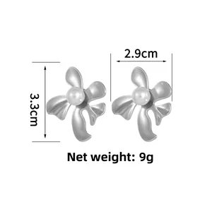 Detailed view of silver flower earrings with pearls and dimensions showing 3.3cm height