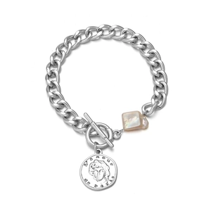 Silver stainless steel OT clasp bracelet featuring a baroque pearl and coin pendant