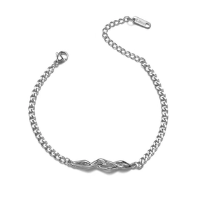 Detail of stainless steel curb chain bracelet with twisted geometric metal links