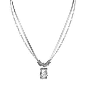 Double-layered silver necklace featuring a snake chain and a clear square crystal pendant