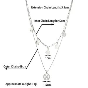 Double-layered stainless steel necklace with smiley face charms and X pendant