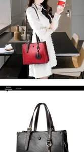 Primer plano de elegantes bolsos de cuero mate retro en colores rojo y negro