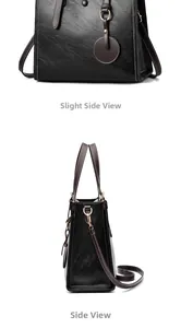 Detalle de bolso de hombro en cuero PU negro con asas marrones y costuras en contraste