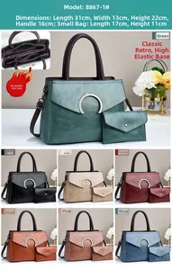 Detailed view of large litchi grain tote bag with horseshoe buckle and matching pouch