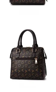 Detail view of brown PU leather tote bag showing back zipper pocket and hardware
