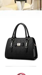 Detail of black handbag with geometric triangle stitching and elegant bow ornament