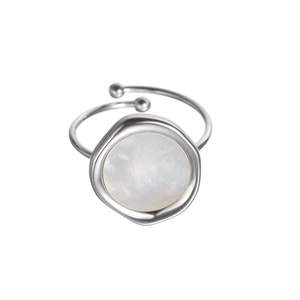 Macro detail of adjustable silver ring with round white mother of pearl inlay
