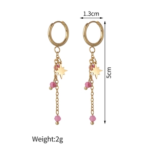 Gold star drop earrings with pink beads and 14K stainless steel tassels on white background