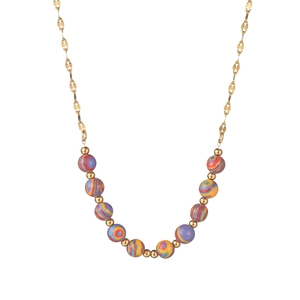 Detail of macaron beaded necklace with colorful marble beads and gold chain finish