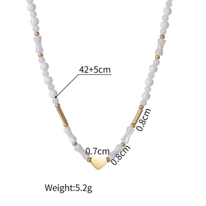 Detailed technical specs showing 14K gold heart necklace with beaded chain measurements