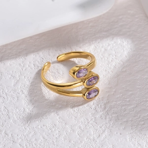 French vintage gold open ring featuring triple layers and three purple oval zircons