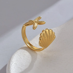Minimalist gold starfish and scallop open ring featuring realistic ocean textures