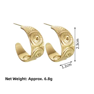 Golden C-shaped geometric fringe earrings with sunburst pattern measuring 2.3cm by 1.1cm
