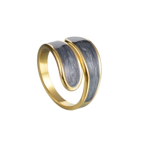Detailed view of spiral wrap ring featuring grey marble texture and gold finish