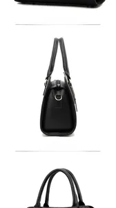 Detailed side view of black faux leather handbag with metal D-rings and sturdy handles
