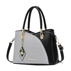 Women's large shoulder bag in black and white plaid with leather trim and gold butterfly charm