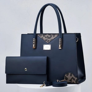 Navy blue faux leather tote bag and wallet set with leopard print patch and gold tag