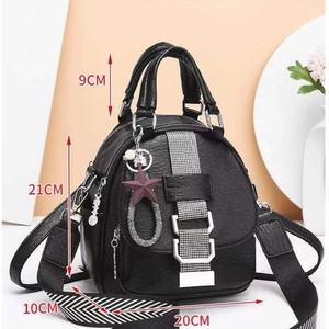 Black soft PU leather backpack with rhinestone accents and size dimensions 20x21x10cm