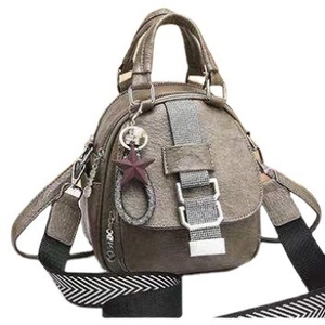 Fashionable olive green wrinkled leather backpack with star charm and striped strap