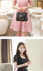 Detail of printed crossbody bags with clover pattern and metallic flower buckle