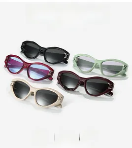 Collection of small-frame cat-eye sunglasses in five colors with silver M-logo on temples