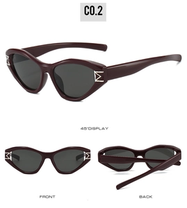 Deep red cat eye sunglasses with grey lenses and golden metal M hinge details