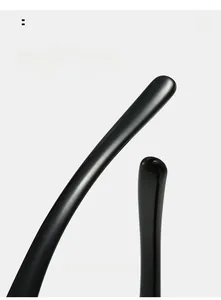 Detail of curved mirror legs on black sunglasses for comfortable and secure wear