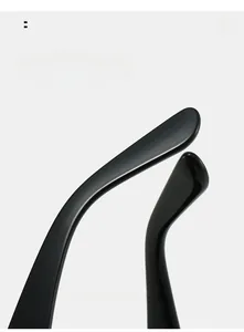 Detail of curved ergonomic black temples on cat-eye sunglasses for comfortable wear