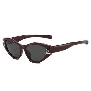 Retro burgundy cat-eye sunglasses with gray lenses and silver M hinge decoration