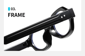 Detail view of oval black frames featuring metal hinge accents and blue light lenses