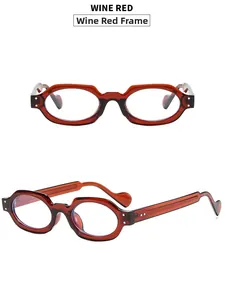 Detail view of wine red oval eyeglass frames with unique geometric faceted edges