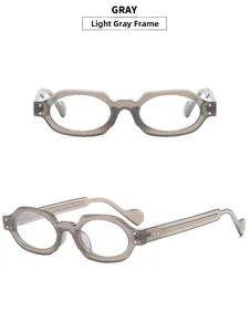 Detail view of oval cloudy dark gray translucent geometric acetate eyewear frame