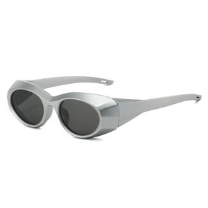 Futuristic silver sport sunglasses with wide side wings and dark lenses for outdoor activities