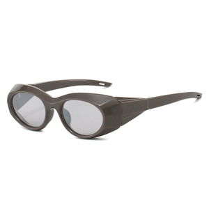 Futuristic wrap-around sports sunglasses with dark brown frames and grey lenses for cycling