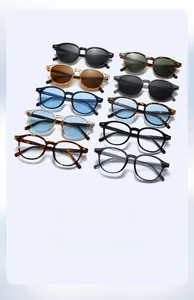 Collection of vintage small frame sunglasses in multiple colors and finishes