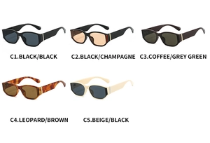 Flat lay of vintage rectangular sunglasses in five color variations with metallic accents