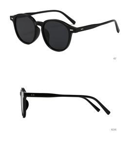 Detail view of retro black round frame sunglasses showing the 45-degree and side profiles