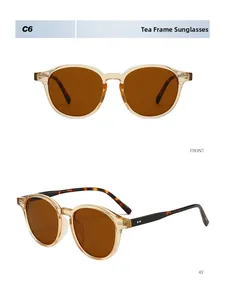 Front and 45-degree angle view of vintage translucent tea-colored round sunglasses C6