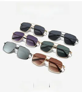 Detailed view of metal aviator sunglasses set with gradient lenses and alloy frames