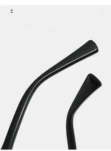 Détail des branches incurvées ergonomiques de lunettes de soleil noires pour le confort