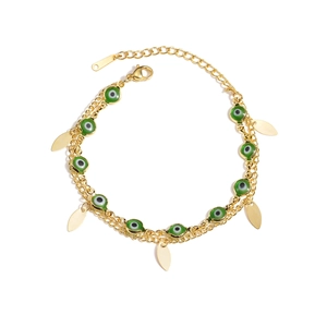 14K gold plated double layer bracelet with green eye beads and gold leaf pendants